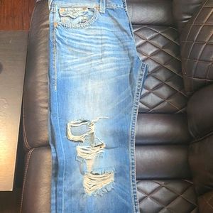 Men's brand new unworn True Religion jeans size 38x31 inseam.added (two) patches